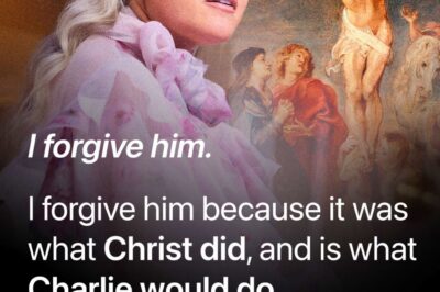 At Charlie Kirk’s memorial, Erika Kirk stunned the nation with words no one expected. With tears in her eyes, she invoked Scripture: “Father, forgive them, for they know not what they do.” Then came the moment that left the crowd breathless: “That young man… I forgive him.” Erika was speaking of Tyler Robinson, the man accused of k!lling her husband. Her voice did not tremble with anger, but with grace. “The answer to hate is not hate,” she declared. “The answer is love. Love for your enemies. Love for those who persecute us. The world needs Turning Point USA.” It was more than a statement — it was a revelation. If this doesn’t give you chills, nothing will