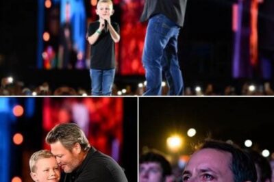A STAGE TURNED SANCTUARY: In the middle of a roaring concert in front of 20,000 people, Blake Shelton stopped the music, put down his guitar, and did something unforgettable. He saw a sign held by a 6-year-old boy named Ethan, which read “Waiting for a new heart, but still want to sing.” In an act of pure grace, Blake knelt down and turned the entire show over to the child, saying softly, “Tonight, this stage belongs to you.” What followed was a moment that transcended music, as Blake’s powerful harmony became a shield for Ethan’s small, brave voice. The arena, lit by thousands of phones like a galaxy of hope, witnessed a superstar step back to let a true warrior shine, proving that the biggest heart in the room belonged to the smallest person.
