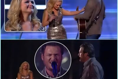 THE MOMENT BLAKE LOOKED AT MIRANDA, TIME STOOD STILL. It wasn’t just another performance — it felt like a wound reopening under the spotlight. Blake Shelton walked onstage with nothing but his guitar and years of silence between them. The first chords of “Famous in a Small Town” echoed through the room, trembling with emotion. Every lyric sounded like a memory he couldn’t let go of. Then came the line that broke everyone’s composure: “She’s captured the heart of millions of Americans… and I’m proud to say I was one of them.” Miranda didn’t speak — she didn’t have to. The look in her eyes said it all. When the last note fell, the applause came too late. The moment had already cut too deep. ▶️Listen this song in the 𝗳𝗶𝗿𝘀𝘁 𝗰𝗼𝗺𝗺𝗲𝗻𝘁 👇