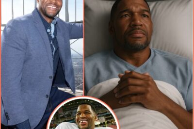 Stay strong, Michael. YOU’RE NOT FIGHTING ALONE!  The nation stands behind Michael Strahan, as the beloved GMA host and NFL legend bravely battles cancer.  Through tears, prayers, and endless love, millions are rallying for the man who’s brought light to their mornings — now facing his darkest days with courage.