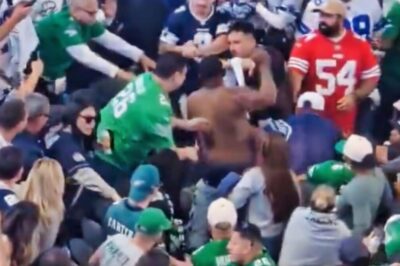 Absolute Mayhem: Eagles & Cowboys Fans Thr0w Haymakers in Massive AT&T Stadium Brawl [VIDEO]