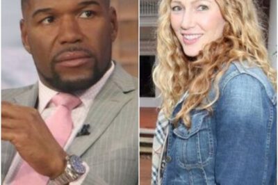 Michael Strahan’s Girlfriend Kayla Quick Thrust Into Spotlight After Anthem Controversy — Her Stunning Journey From Troubled Past to Wellness Mogul Has Everyone Talking 😳✨After nearly a decade of keeping their relationship out of the public eye, Michael Strahan’s longtime partner Kayla Quick is suddenly at the center of a media storm. Following the recent anthem controversy, attention has turned to her remarkable transformation — from a turbulent past to building a thriving wellness brand. Insiders say her story is one of resilience, reinvention, and redemption… but some close to the couple hint there’s more beneath the surface. Fans can’t stop asking: what’s the real story behind Kayla Quick?k