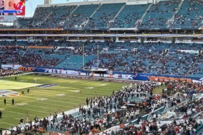 CFP Embarrassment: Major Quarterfinal Drew Fewer Fans Than a High School Game 🏟️😳What was supposed to be a marquee College Football Playoff quarterfinal turned into a brutal optics problem. Fans were expecting a packed stadium and a postseason atmosphere—but the stands told a different story, with large sections visibly empty and the crowd looking shockingly thin for a game of this magnitude. The images spreading online have become the real headline, fueling backlash and raising uncomfortable questions about just how big this matchup really was..k